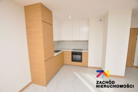Atrakcyjna kawalerka z tarasem i balkonem